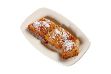 syrup dessert with coconut on top