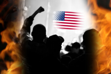 Crowd of passionate protesters gathered under the USA flag, expressing opposition to the Trump...