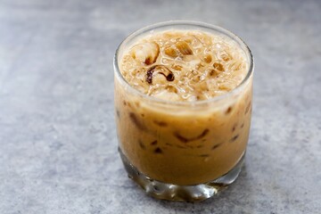 iced coffee on cement background	