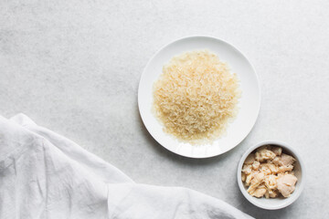 Top view of ingredients for making rice and chicken porridge