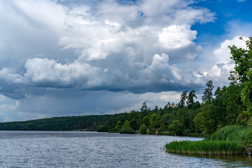 Obraz premium Different landscapes on the lake in summer.