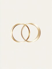 Elegant minimalistic wedding rings logo showcasing sophistication with subtle golden reflections against a soft white background