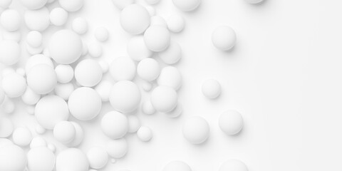 Heap of different scaled white spheres or balls geometrical background wallpaper banner pattern flat lay from above, fading out with copy space