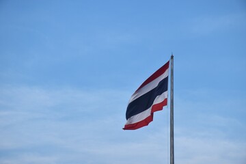 tree colors national Thailand flag red mean nation with white mean religon and blue mean majesty king flowing from wind blow on pole in sky background