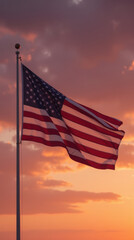 waving flag against colorful sunset sky creates patriotic and serene atmosphere