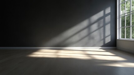 Obraz premium Empty room with sunlight streaming through a window. A modern minimalist interior design with dramatic shadows cast on the light-colored floor