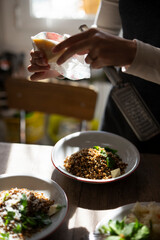 Enjoying the delicious meal prep with fresh ingredients in a cozy kitchen atmosphere