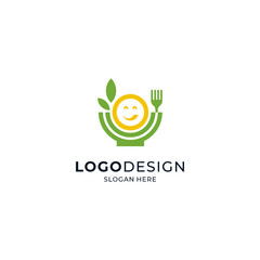 a bowl of salad with a fork and a smiling person for the salad and healthy food logo