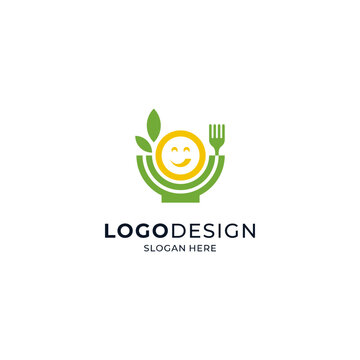 a bowl of salad with a fork and a smiling person for the salad and healthy food logo