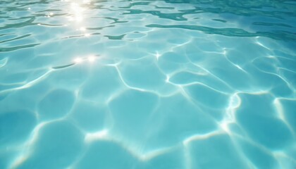Fototapeta premium Tranquil blue water surface. Sunlight reflects creating clear, rippled texture. Aquatic scene evokes summer, calmness, relaxation, vacation. Clean, pristine, bright. Pool background.