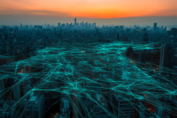 Aerial cityscape at sunset, overlaid with a network of glowing teal lines, representing digital connectivity and urban infrastructure