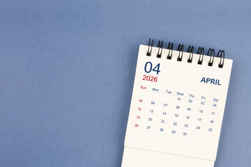 April 2026 Mini monthly desk calendar for 2026 year on blue color background.