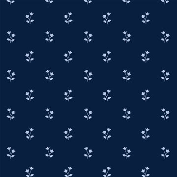 Small white flowers pattern doodle shapes motif continuous blue background. Modern floral fabric design textile swatch ladies dress, men's shirt all over print block.