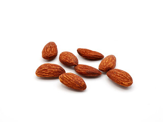 Almonds rest against a clean white background