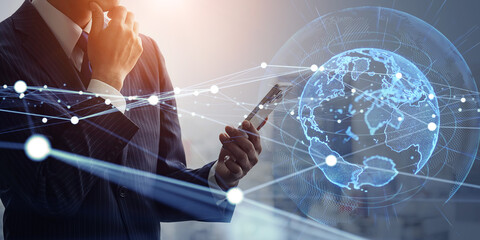 Business people using smartphones and global network concept