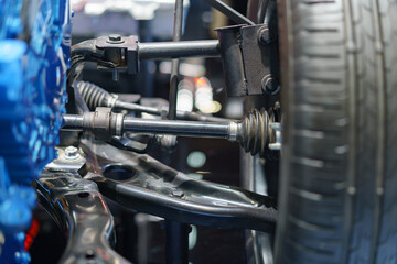 Close-Up of Modern Car Front Suspension and Steering Mechanism..