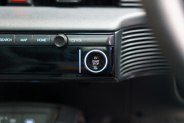 Close-Up of EV Start-Stop Button and Volume Knob