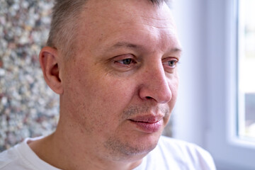 Fototapeta premium face of angry person dissatisfied with life and everything that happens. man is grimacing