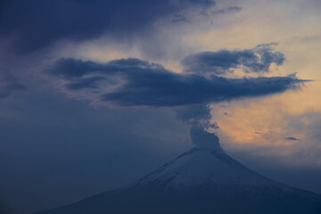 Popocatepetl and Iztaccíhuatl volcanic landscape with fluffy clouds. Izta-Popo Zoquiapan National Park