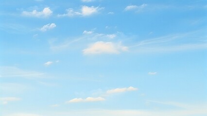 Fototapeta premium Light Blue Vault of Heaven, Filmy Clouds Wandering. The light blue sky is pure and vast. A few filmy clouds float leisurely, as if dancing gently, adding a touch of leisure and agility to the boundles