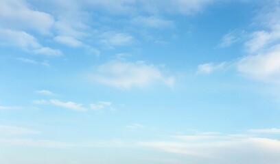 Light Blue Vault of Heaven, Filmy Clouds Wandering. The light blue sky is pure and vast. A few filmy clouds float leisurely, as if dancing gently, adding a touch of leisure and agility to the boundles