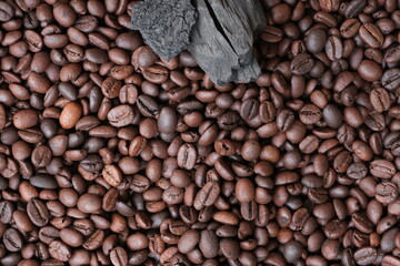 Coffee beans and charcoal, natural production concept