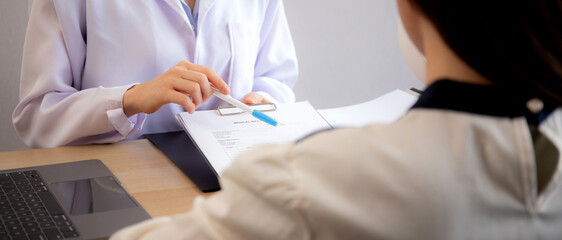 Young asian patient woman consulting with doctor in coat about wrinkle and skin for rejuvenate and...