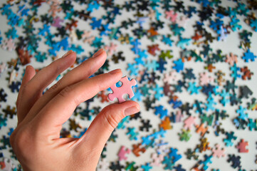 Holding a Puzzle Piece - Symbol of Problem Solving and Completion