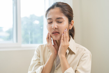 Jaw pain, health care concept. Teeth pain and dentistry asian young woman, girl suffering touching...
