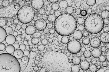 Close-up macro bubble texture,Close up macro Aloe vera gel serum cosmetic texture blue background...