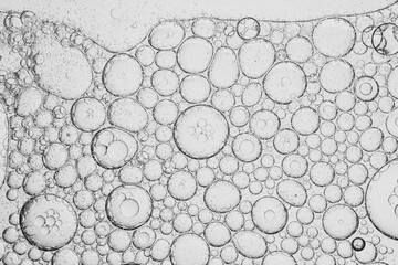 Close-up macro bubble texture,Close up macro Aloe vera gel serum cosmetic texture blue background...