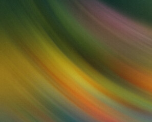 A blurred abstract background featuring a blend of yellow green and orange colors creating a soft...