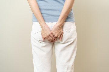 Health care, pain asian young woman suffering from hemorrhoid, anus, diarrhea and constipation,...