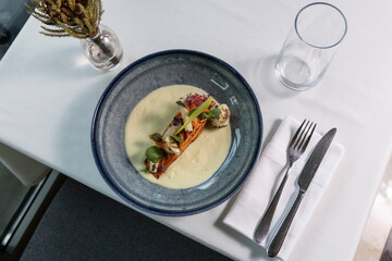 Grilled salmon was served at the fine dining restaurant