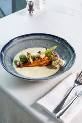 Grilled salmon was served at the fine dining restaurant