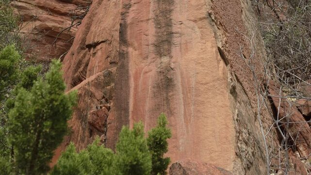Red rock formation towering over historic Palatki Ruins in Arizona's picturesque landscape