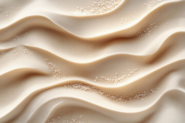 Obraz premium Textured sand with wavy patterns and scattered granules, creating a serene and natural aesthetic.