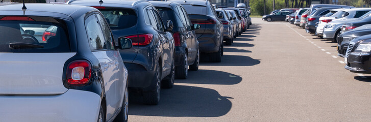 A lot of cars in a rows. Used car sales
