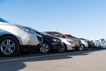 A lot of cars in a rows. Used car sales