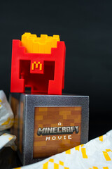Fototapeta premium Bangkok, Thailand - April 6, 2025 : Fry Helmet Minecraft from McDonald, Toy form Minecraft blind box from McDonald's collaborates Minecraft the movice