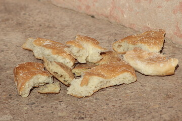 Dry bread lying on the floor