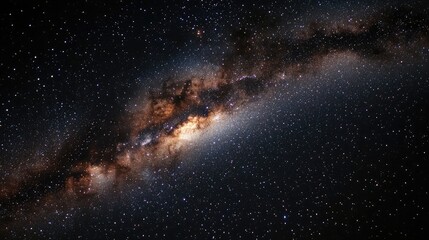 Obraz premium A spectacular view of the Milky Way stretching across the night sky, dense with stars.