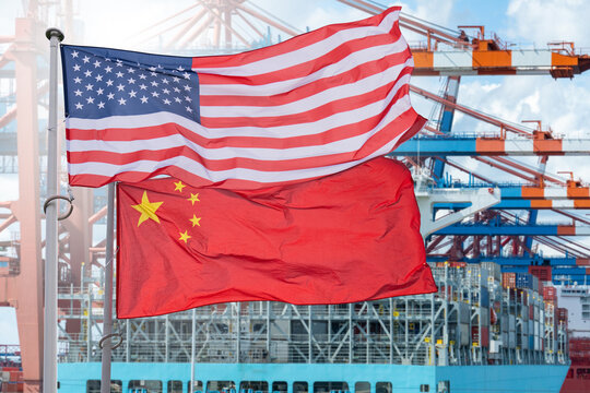 American and Chinese flags on the background of ship with containers. Symbol of trade war
