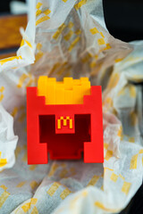 Fototapeta premium Bangkok, Thailand - April 6, 2025 : Fry Helmet Minecraft from McDonald, Toy form Minecraft blind box from McDonald's collaborates Minecraft the movice