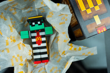 Fototapeta premium Bangkok, Thailand - April 6, 2025 : Toy of Zombie hamburglar form McDonald. Blind box toy from McDonald's collaboration with Minecraft movie.