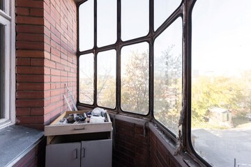 the balcony of an apartment on the upper floors of an apartment building