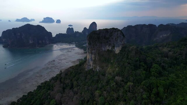 limestone cliffs emerging from tropical forest. Great aerial view flight drone
