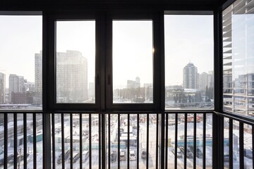 Fototapeta premium the balcony of an apartment on the upper floors of an apartment building