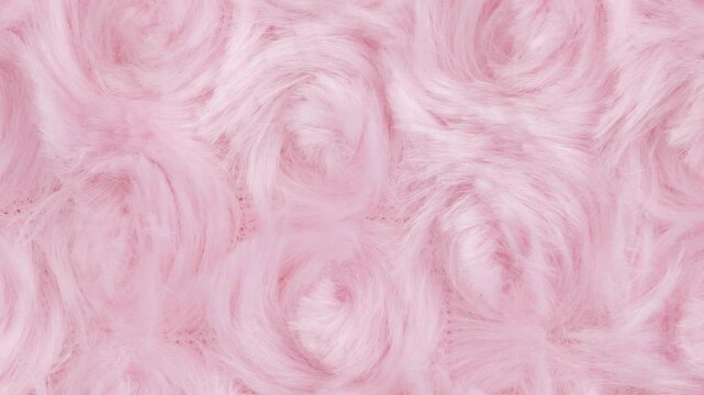 Pink soft fluffy swirl material background pan left