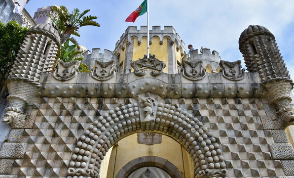 Pena Palace Exterior Gate with Pyramidal and Spherical Studs, Low Angle with Portuguese Flag